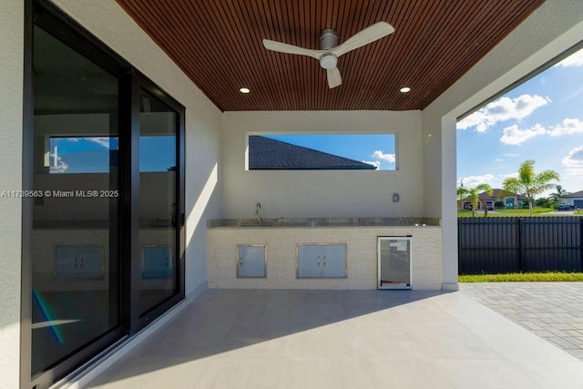 view of patio / terrace with ceiling fan