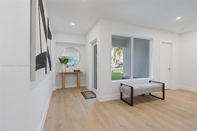 corridor featuring light hardwood / wood-style flooring