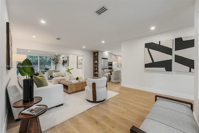 living room featuring light hardwood / wood-style flooring