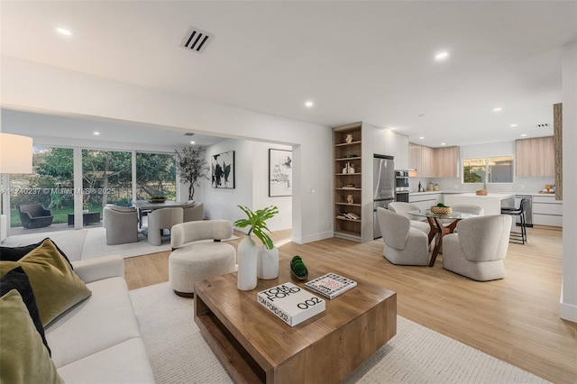 living room with light wood-type flooring