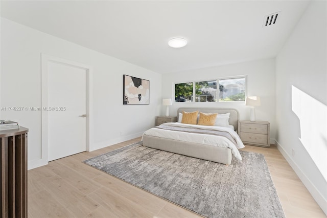 bedroom featuring light hardwood / wood-style floors