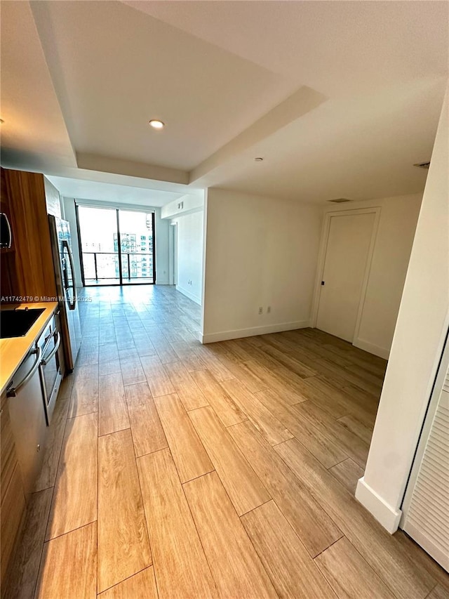 interior space with light hardwood / wood-style floors