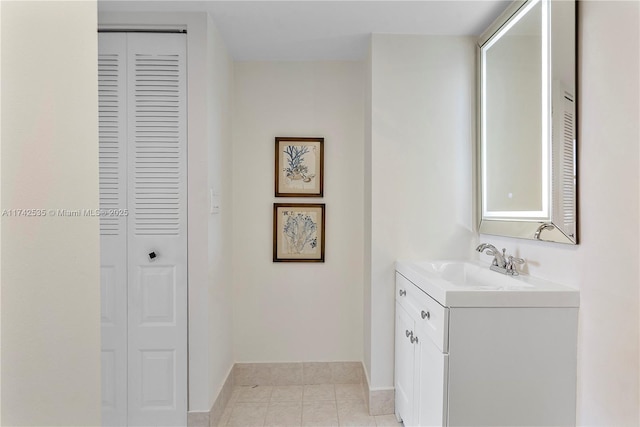 bathroom with vanity and tile patterned floors