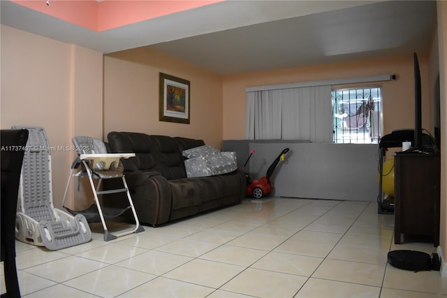 living room with light tile patterned floors