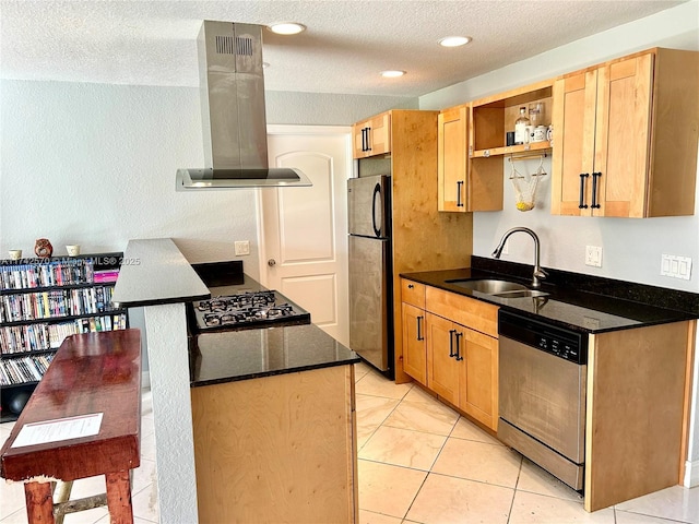 kitchen with light tile patterned floors, a textured ceiling, island exhaust hood, and gas range