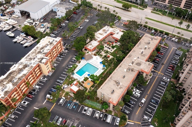 birds eye view of property with a water view