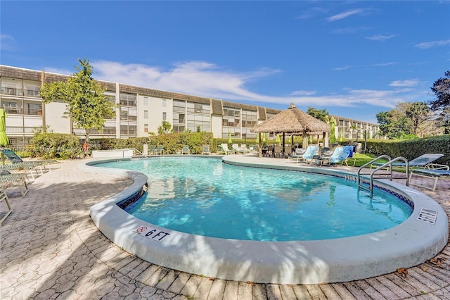 view of swimming pool with a gazebo