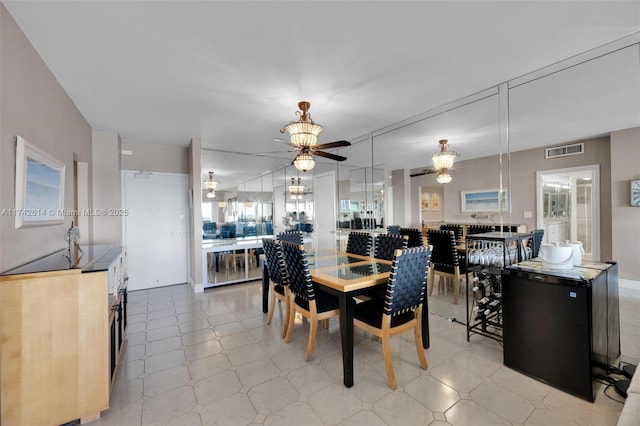 dining space with ceiling fan