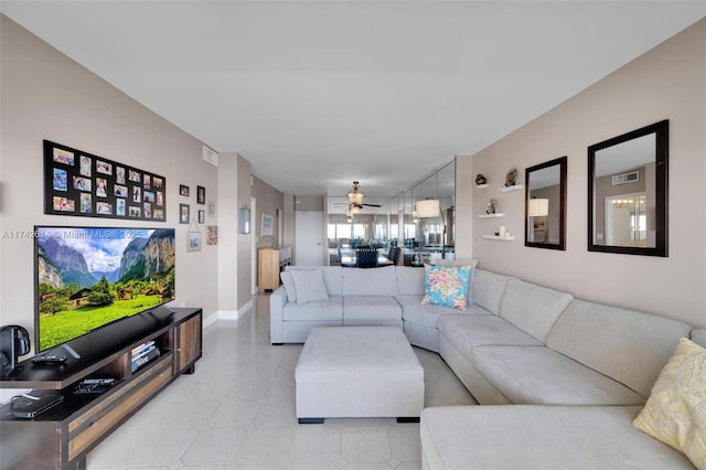 living room featuring ceiling fan