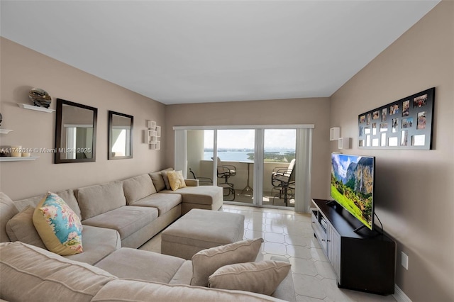 living room with light tile patterned flooring