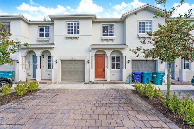 view of front of property with a garage