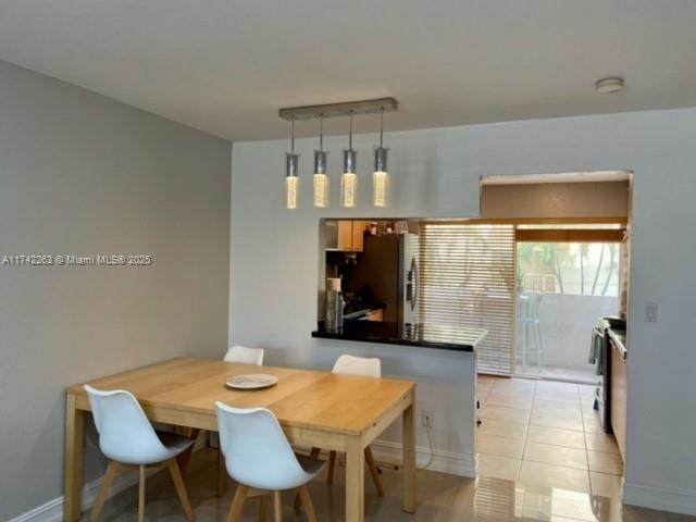 dining room with light tile patterned floors