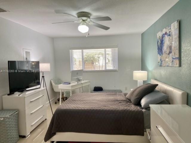 bedroom featuring ceiling fan