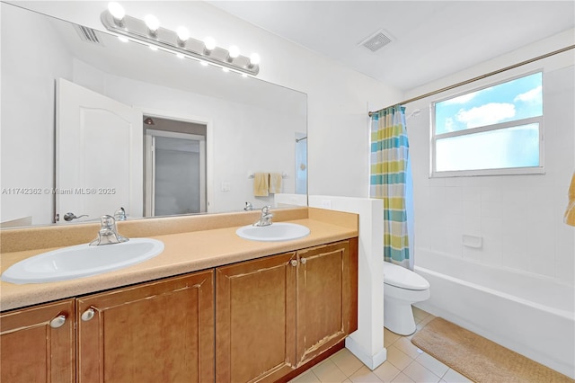 207 Berenger Walk, Royal Palm Beach, FL 33414 - bathroom featuring tile patterned flooring, visible vents, a sink, and toilet