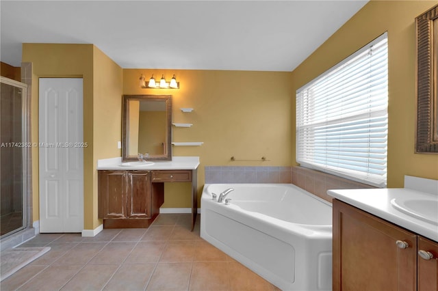 207 Berenger Walk, Royal Palm Beach, FL 33414 - bathroom featuring tile patterned flooring, a sink, a bath, two vanities, and a stall shower