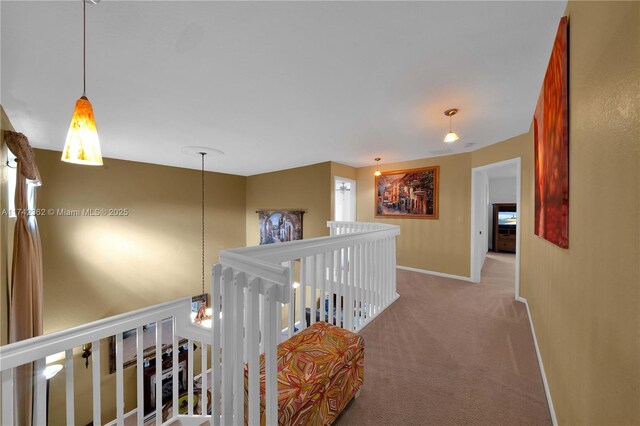 207 Berenger Walk, Royal Palm Beach, FL 33414 - hall with baseboards, carpet flooring, and an upstairs landing