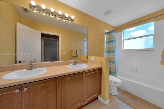 207 Berenger Walk, Royal Palm Beach, FL 33414 - full bathroom with tile patterned floors, visible vents, a sink, and toilet