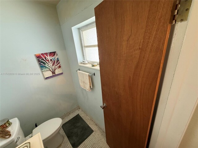 11277 SW 172nd St Unit I1742D, Miami, FL 33157 - bathroom with toilet and tile patterned flooring