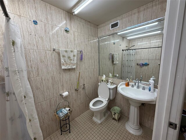 11277 SW 172nd St Unit I1742D, Miami, FL 33157 - full bath featuring tile patterned flooring, tile walls, and tiled shower