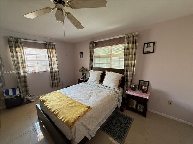 11277 SW 172nd St Unit I1742D, Miami, FL 33157 - bedroom with light tile patterned floors and a ceiling fan