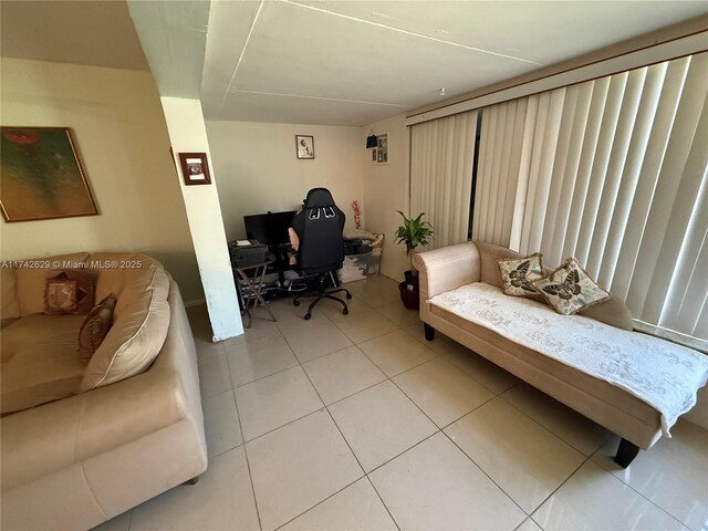 11277 SW 172nd St Unit I1742D, Miami, FL 33157 - bedroom featuring an office area and light tile patterned flooring