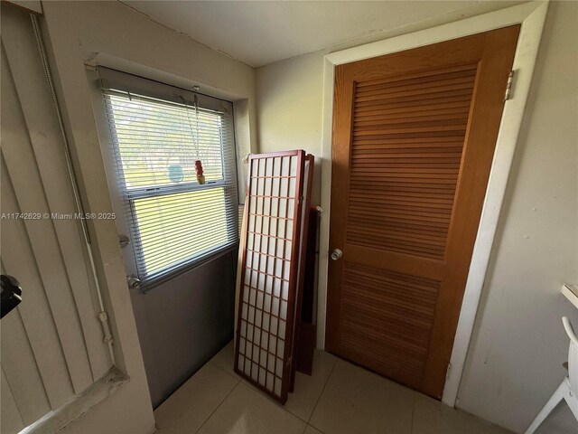 11277 SW 172nd St Unit I1742D, Miami, FL 33157 - doorway to outside featuring light tile patterned floors