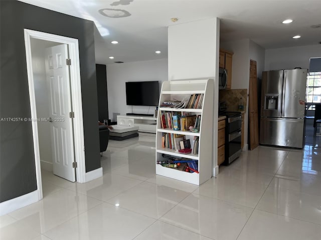 hallway with light tile patterned floors