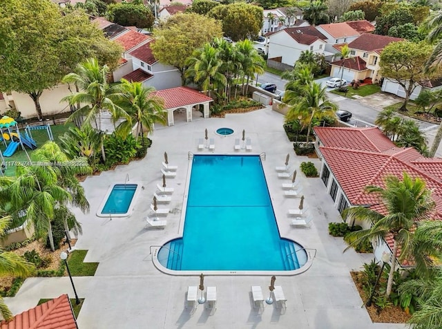 view of swimming pool with a patio area