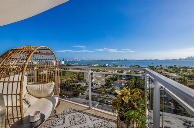 balcony featuring a water view