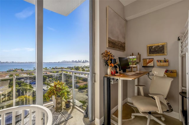balcony featuring a water view