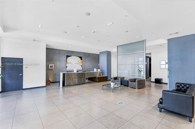 building lobby featuring visible vents