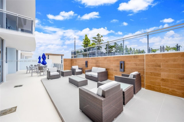view of patio featuring outdoor lounge area and visible vents