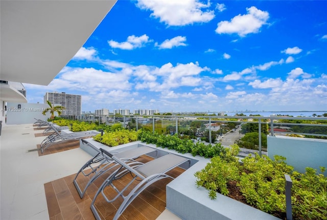 exterior space with a view of city and a balcony