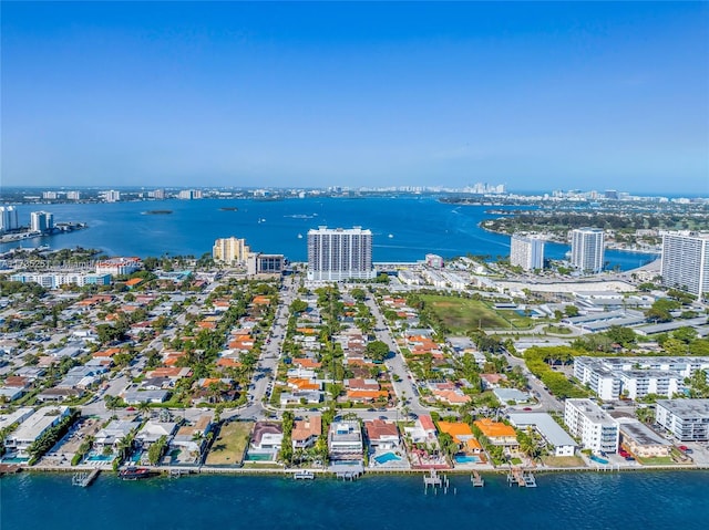 aerial view featuring a view of city and a water view