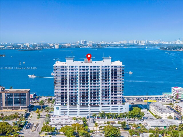 aerial view with a water view and a city view