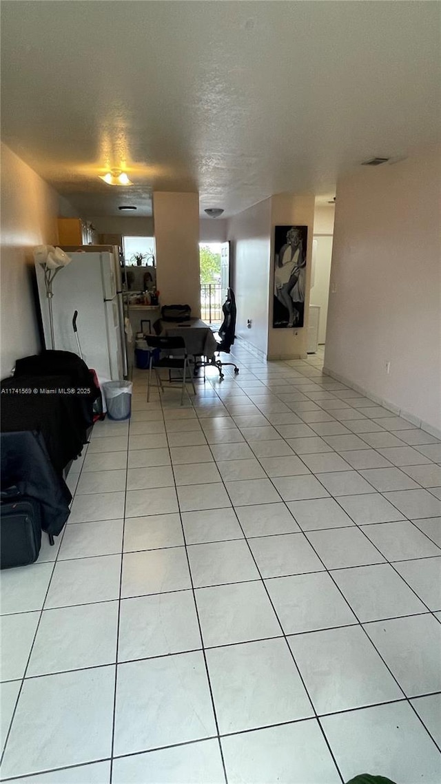 living room with light tile patterned floors