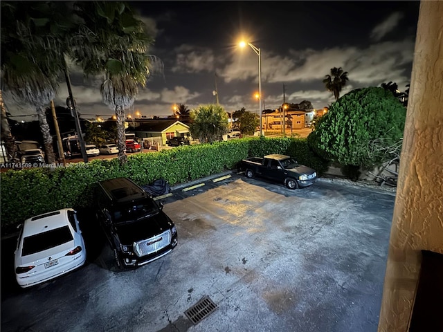 view of parking at dusk