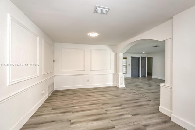 empty room featuring hardwood / wood-style floors