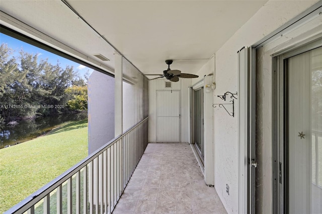 balcony featuring ceiling fan