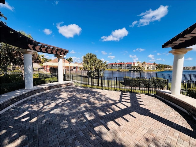 view of patio / terrace featuring a water view