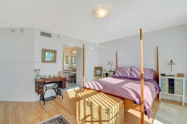 bedroom with wood-type flooring