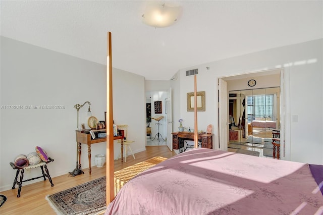 bedroom featuring light wood-type flooring