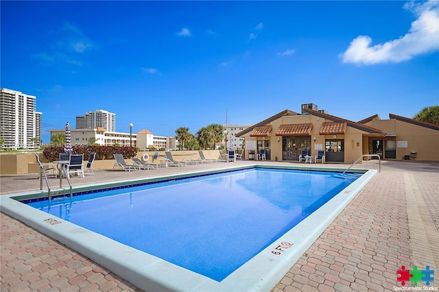 1036 US Highway 1 Unit 216, North Palm Beach, FL 33408 - community pool featuring a patio area