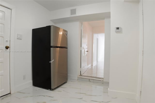 kitchen with stainless steel fridge