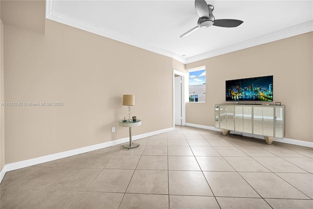 unfurnished living room featuring light tile patterned flooring, ceiling fan, and ornamental molding