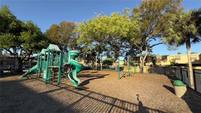 community jungle gym with fence