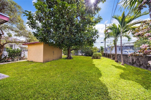 view of yard with a storage shed