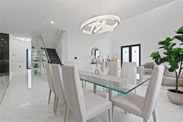 dining area featuring a chandelier