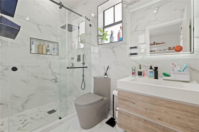 bathroom with walk in shower, vanity, toilet, and tile walls