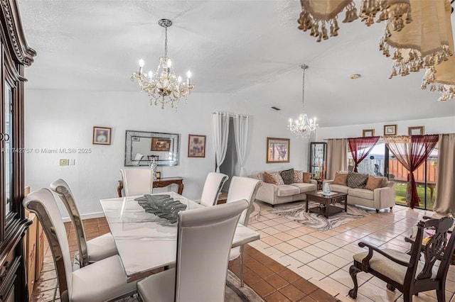 tiled dining space featuring lofted ceiling, a textured ceiling, and a chandelier